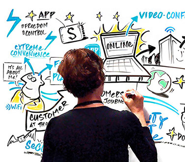 Rachel Dight at Swivel Creative creating live scribing visuals as conversations, ideas and emerging themes unfold during a conference.